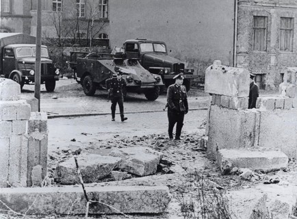 The refugees rammed the wall with a heavy truck and then fled on foot into the French Sector of