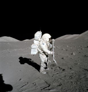 Astronaut Harrison Schmitt collects lunar rake samples during EVA