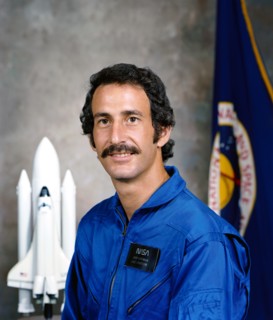 Astronaut candidate Jeffrey A. Hoffman in blue flight suit
