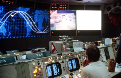 An overall view of activity in the mission operations control room