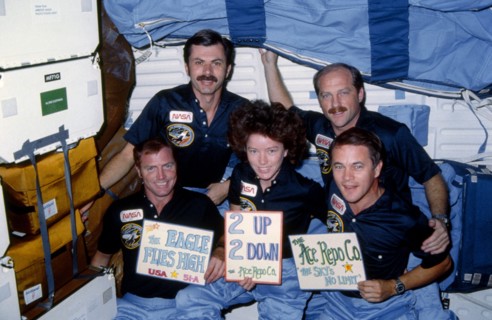 The five-member crew celebrates a successful mission
