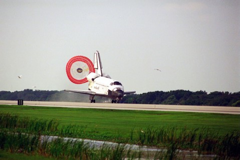 The orbiter drag chute deploys after Atlantis