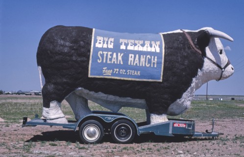 1980s America -  Bull-Big Texan sign, Amarillo, Texas 1982
