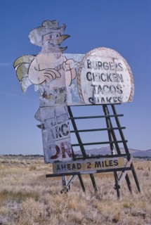 1990s America -  Chicken cowboy billboard, Elko, Nevada 1991