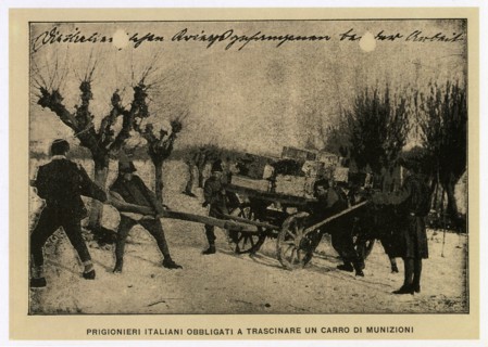 Italian prisoners forced to drag an ammunition wagon