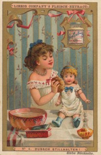 Image Series Girl Playing With A Doll: Pretty Hold Still