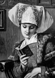 Young Woman In Traditional Costume In Her Home