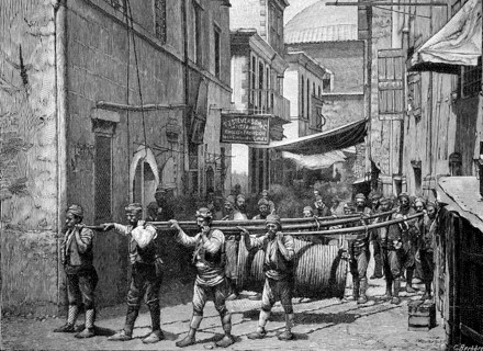 Load Carriers In Armenia Carry A Large Pulley With Wire Rope