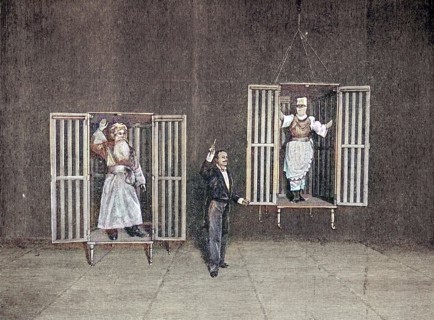 The Illusionist Thorn Demonstrates The Appearance And Disappearance Of Persons In Transparent Cages