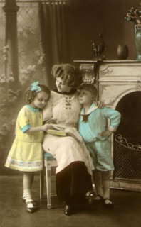 Mother and Children Read Together.