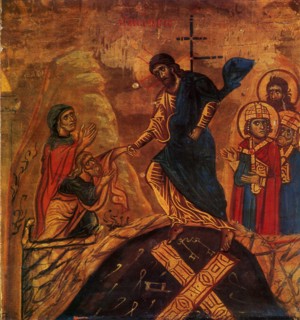 Jesus grabs Adam by the Wrist.