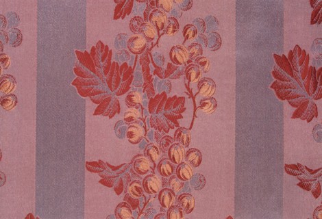 Woven silk pattern of red leaves and berries.