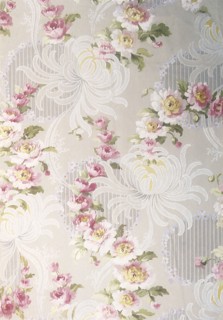 Purple white floral repeat pattern on light background.