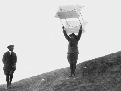 italy, the top of bisbino mountain, boy scout throwing the kite flying deer, 1910-20