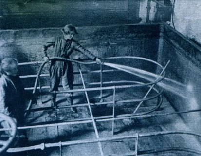 Cleaning brewery vats at Burton-on-Trent.