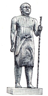 Sheikh Al Beled from the Sahara, a wooden sculpture.