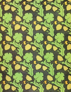 Back cover with floral and plant designs.