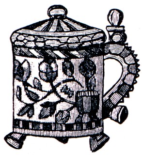 Scandinavian carved and decorated mug.