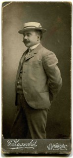 A man in the hat.