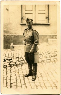 Soviet Army lieutenant, standing on the street.