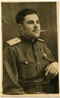 Air Force lieutenant with a cigarette in his mouth.