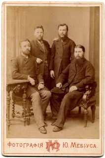 Four of the clergy in secular clothes.