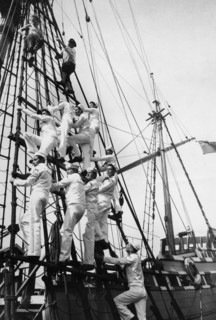 Cutty sark's godfrey wicksteed tops with guitarist graham nunn during sailors rope instruction.