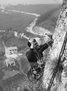 A climber plants the last nail.