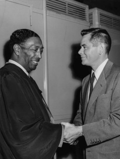 Juano Hernandez and Glenn Ford.