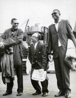 Harold Lloyd Between Two Players Of The Harlem Globetrotters.