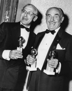 George Cukor and Jack L. Warner.