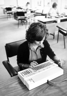 Employees work with computers, Italy 1981