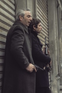 Policemen during a mugging, milan, 70's