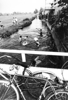 Little boys enjoing in a canal, 70's