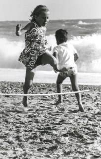 Children playing on the beach, 70's