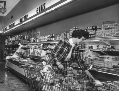 A woman in a usa market, 60's