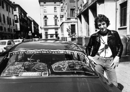 Young man with his car, turin, 70's