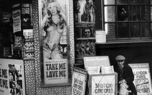 Uk, london, street vendor of evening standard newspaper, 70's