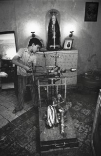 Little boy weighting metal, juvenile work, 80's
