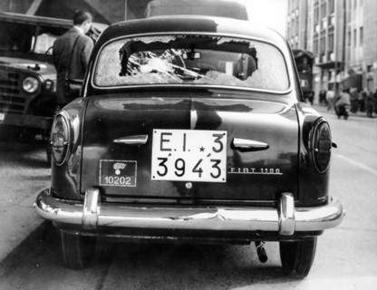 Car of the police destroyed by protesters, Rome, 1966