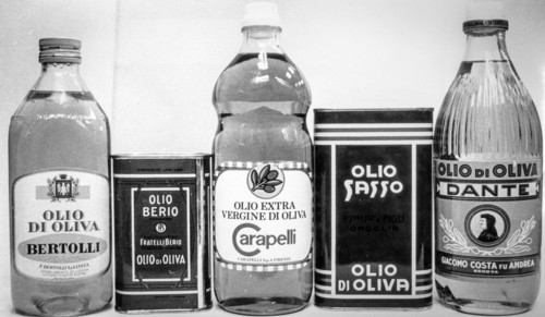 Olive oil bottles and cans