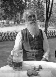 Elderly man drinking beer, Munich, Germany