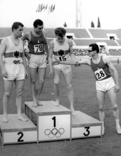 Livio berruti shaking hands with Sergio Ottolina on the podium, athletics, 1962