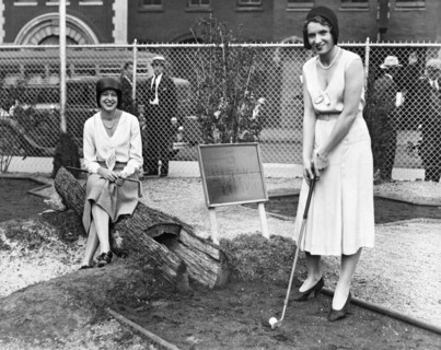 Women Playing Miniature Golf