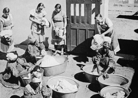 Housemaids doing the big wash on a German farm