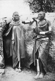 Maasai women with heavy metal jewelry
