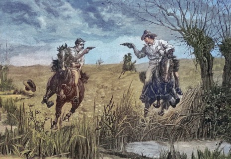 Amerikanische Cowboys duellieren sich mit Pistolen vom Pferd aus