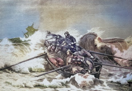 Rescue crew with a lifeboat fights its way through the surf to a ship in distress