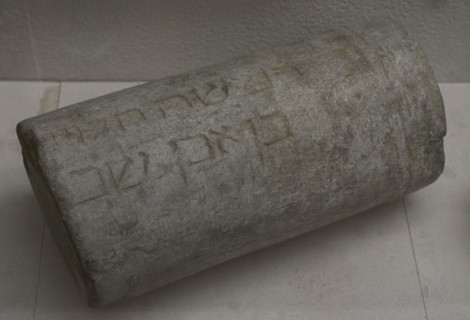 Fragment of a funerary cippus.