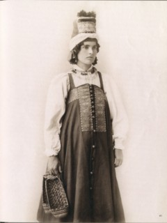 Young Russian woman in traditional cultural dress from Southern Russia